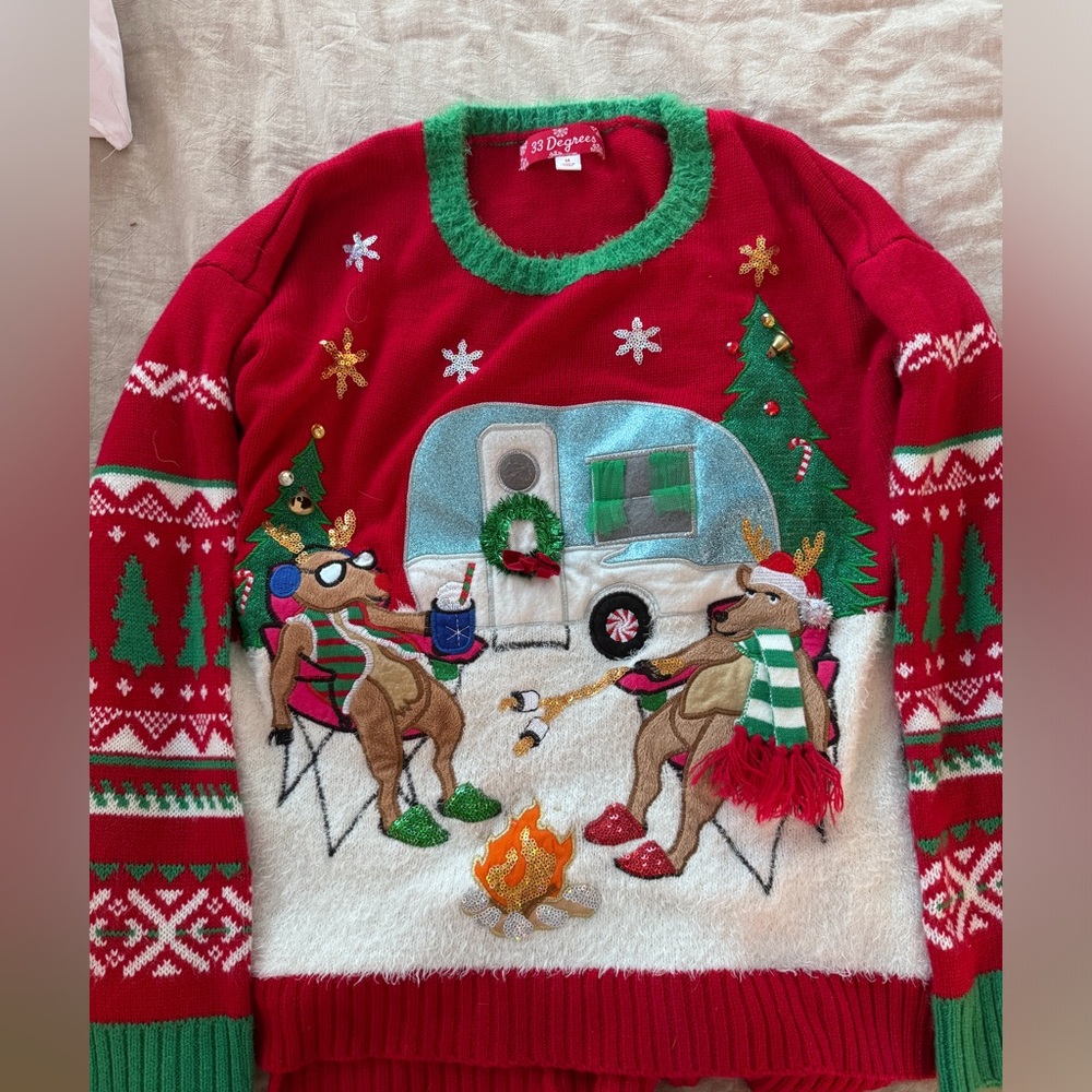 Christmas sweater with friends at a camper